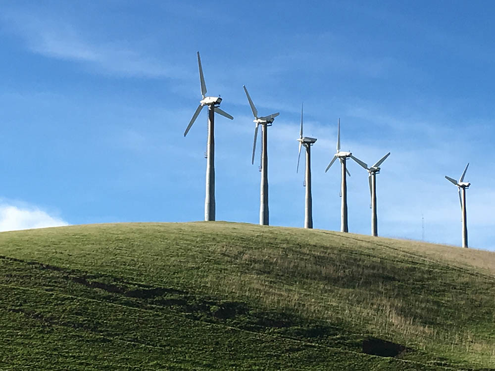 air turbines on green grass