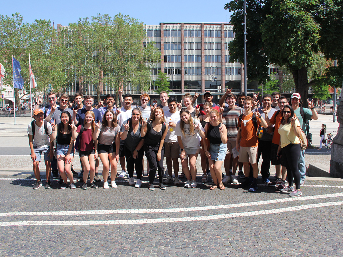Group of students posing in parking lot