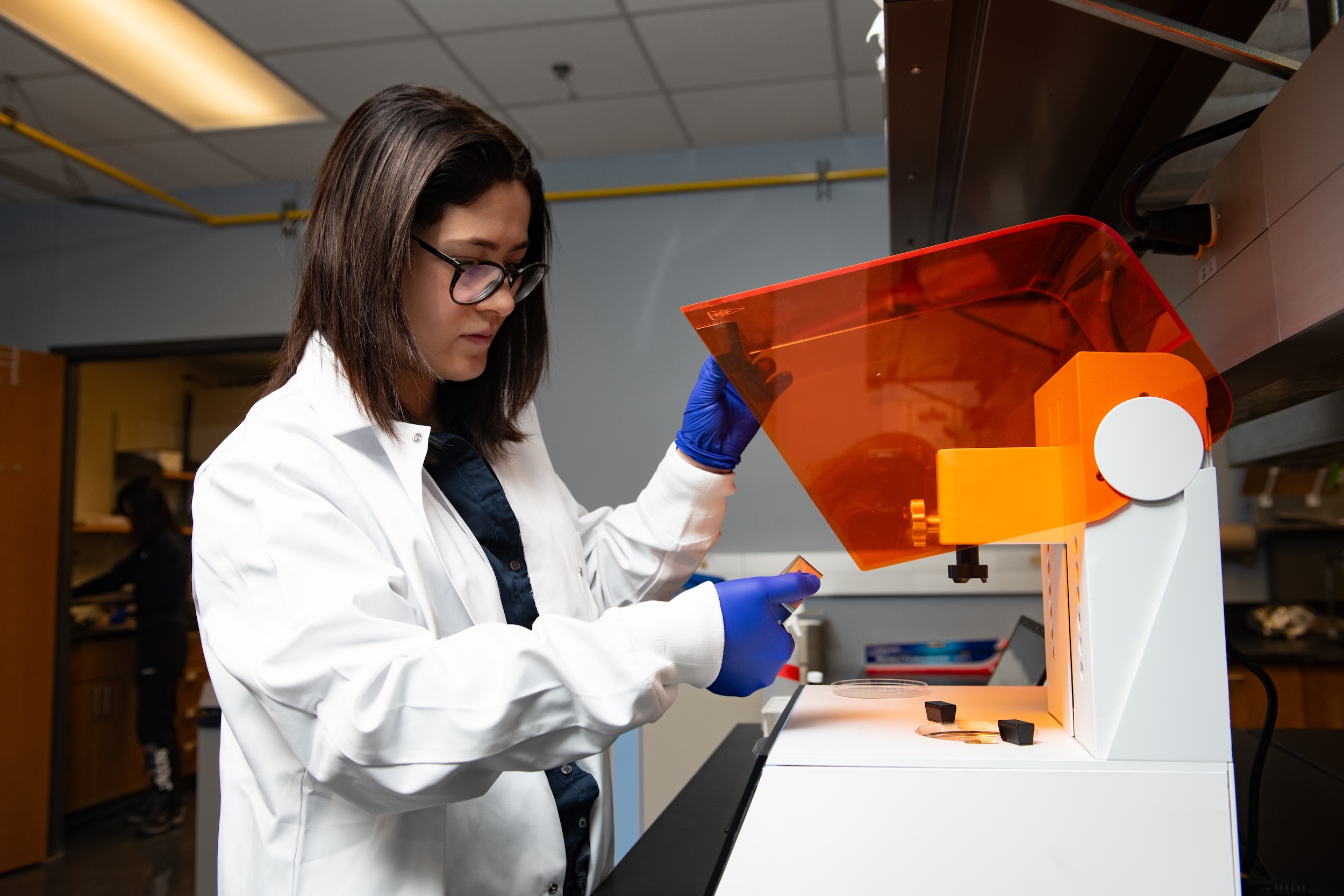 Texas mechanical engineer Maryam Tilton using equipment in her lab.