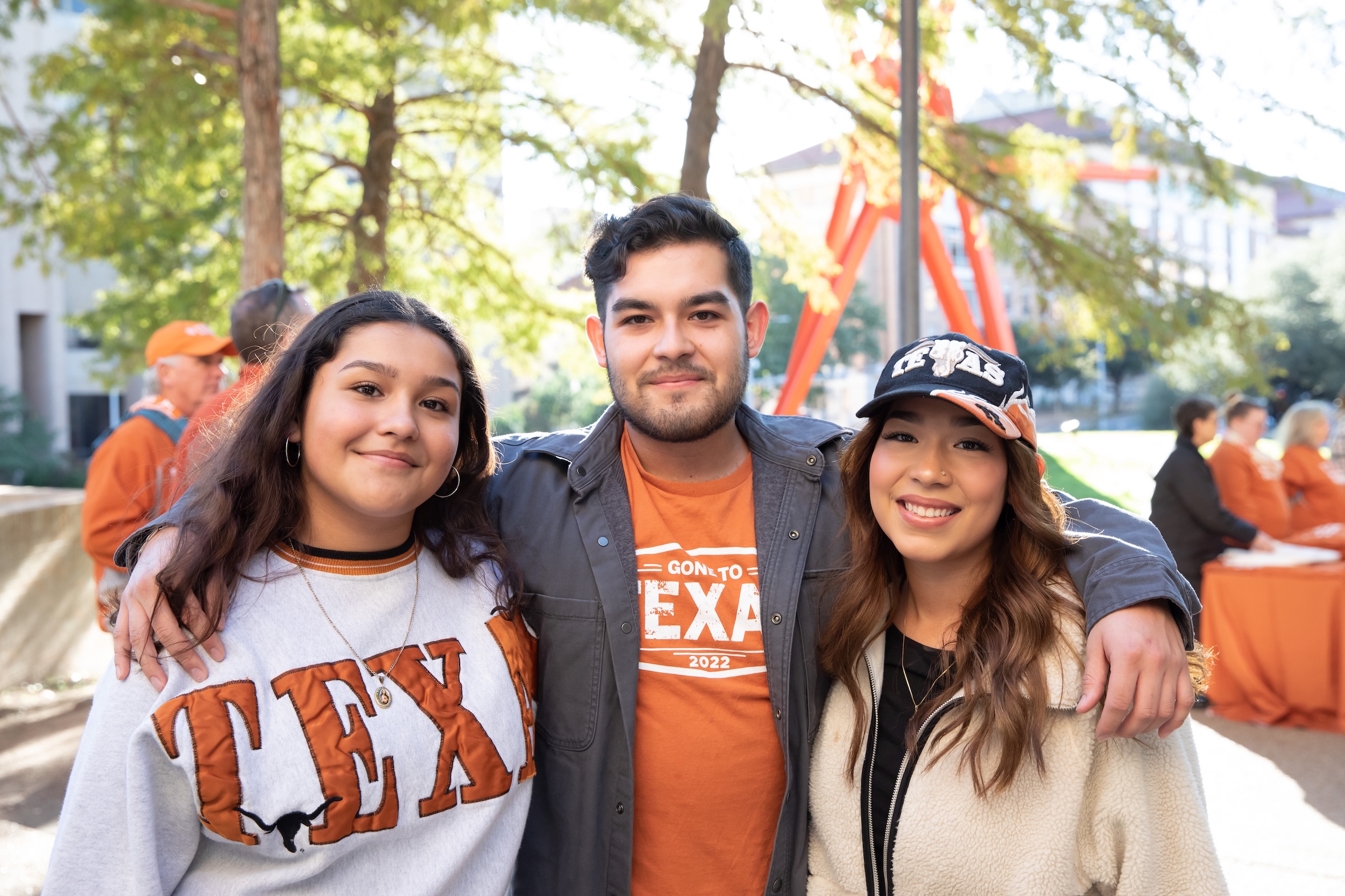 Texas Mechanical Engineers pose at a tailgate event.