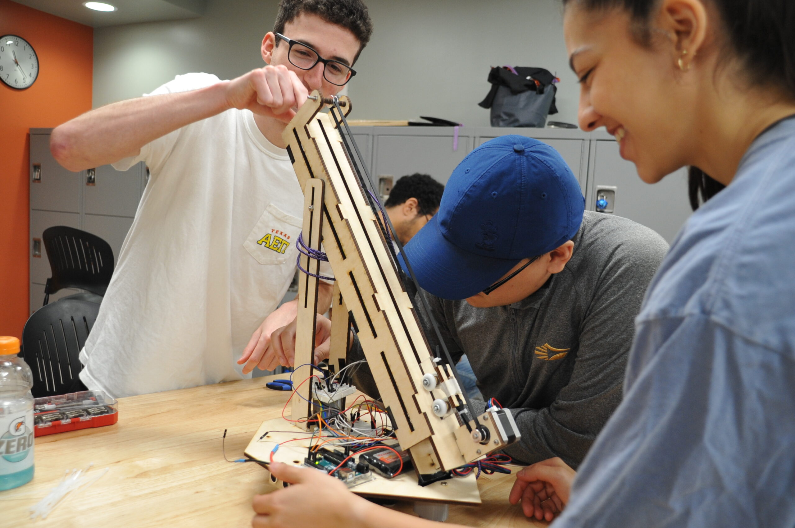 Mechanical engineers at UT Austin working in a lab
